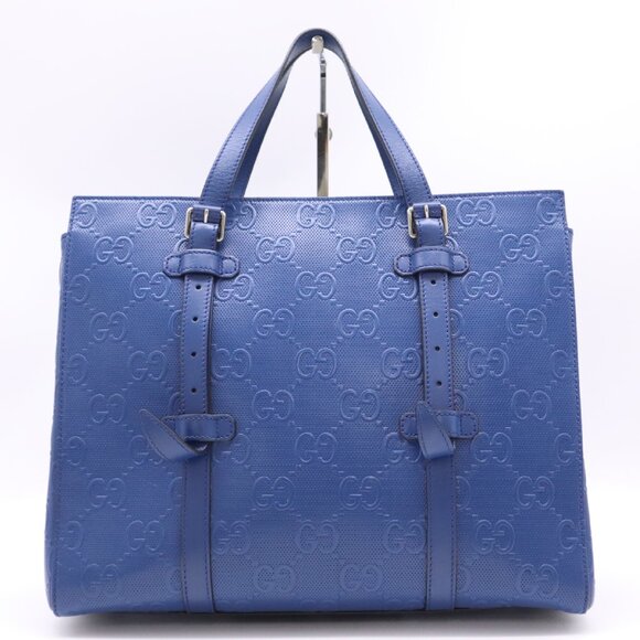 Gucci Handbags - GUCCI Blue GG embossed leather tote bag